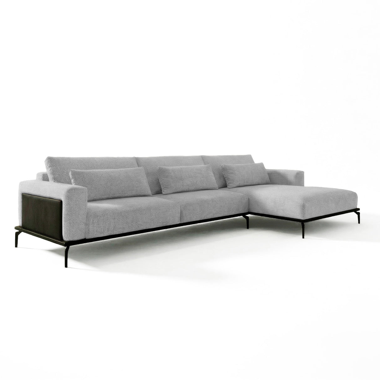 Sofá con chaise longue de tres cuerpos.