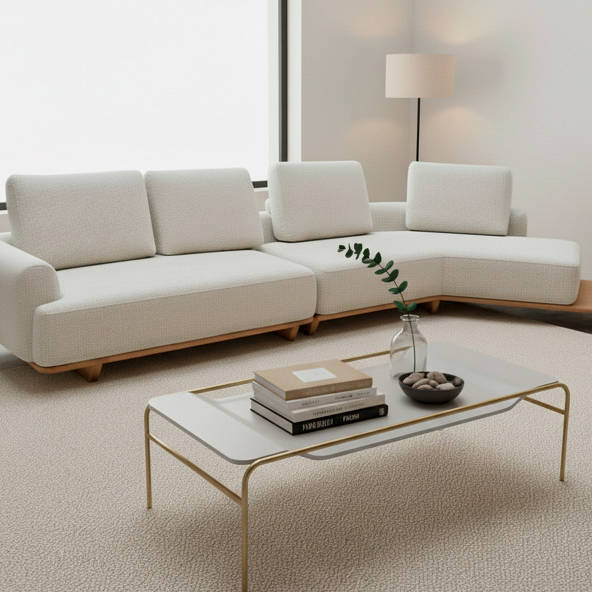 Sofá de dos cuerpos con pouf del lado derecho y mesa de madera
