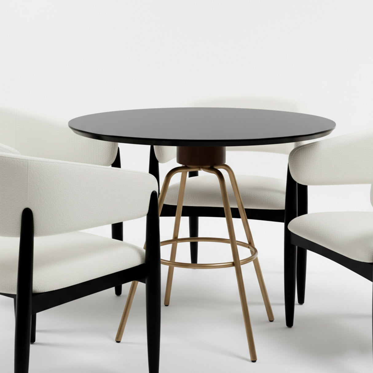 Set de mesa de comedor circular color negro con juego de cuatro sillas color blanco.