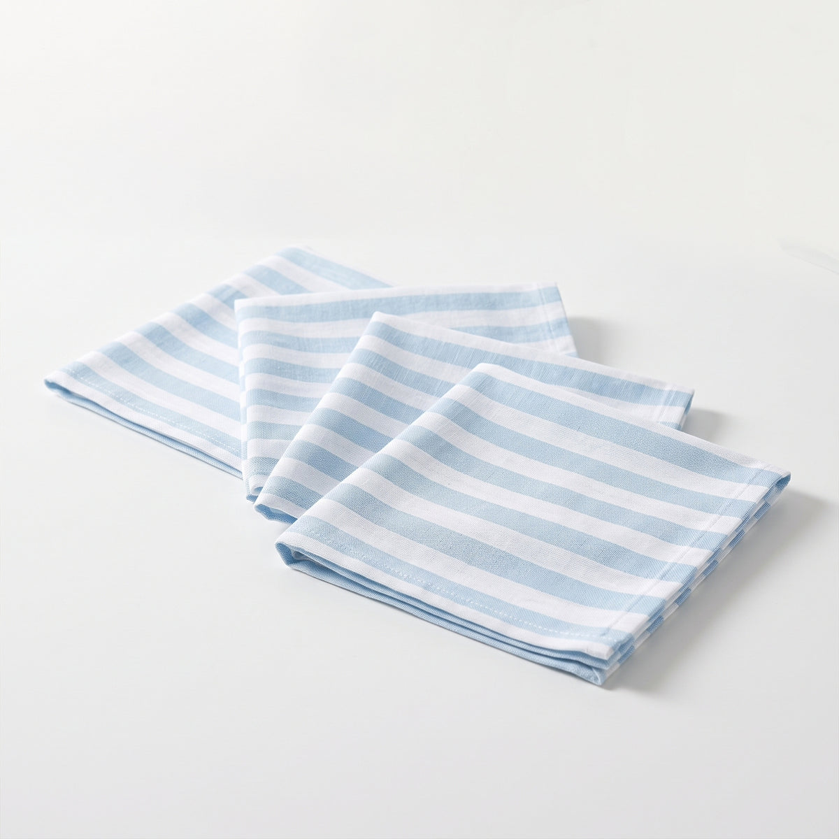 Set  4 Servilletas Laika Rayas Celeste