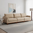 Sofá de tres cuerpos color beige con tapizado impermeable