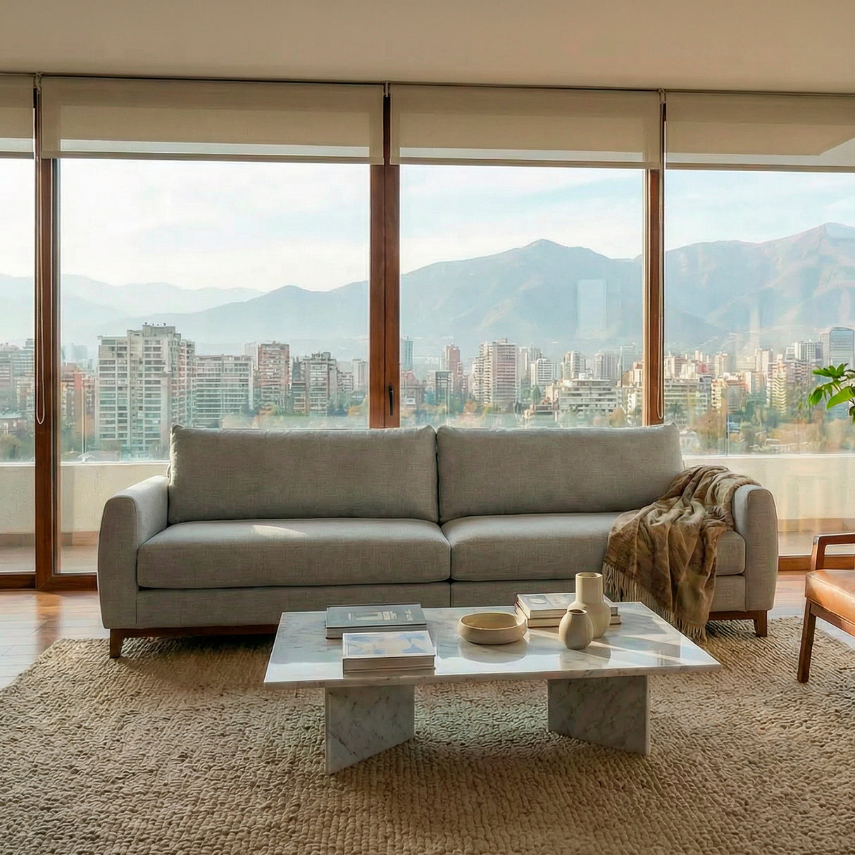 Sofá de dos cuerpos en tela lino color gris.