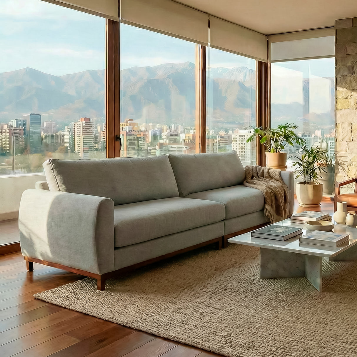 Sofá de dos cuerpos en tela lino color gris.