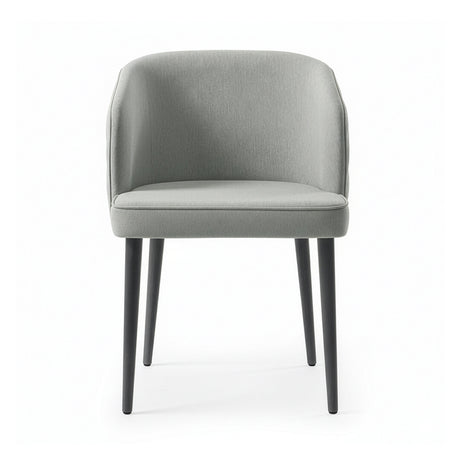 Silla con respaldo envolvente, acolchado con patrón y agarradera de metal.