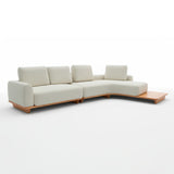 Sofá de dos cuerpos con pouf del lado derecho y mesa de madera 