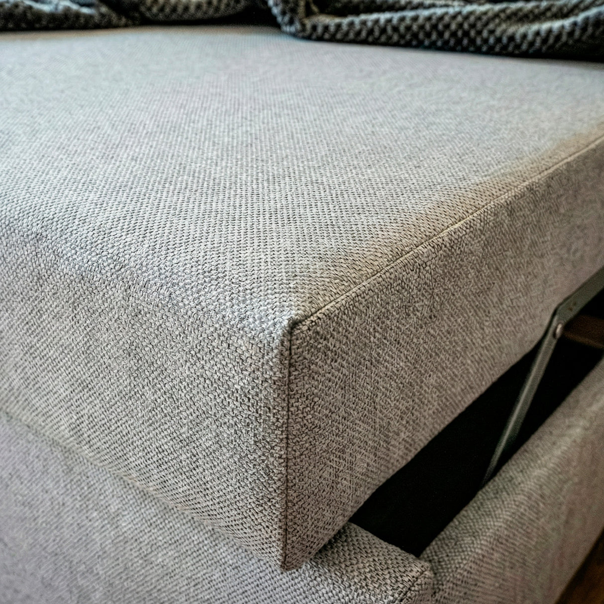 sofá cama de dos cuerpos color gris 